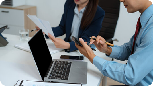 Two people collaborating in an office